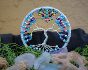 heavens harmony small tree of life sun catcher made with silver wire and blue, purple, clear, gold and silver seed beads